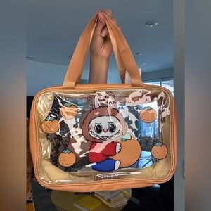 Labufu Little Monsters clear plastic pouch for stadium or makeup NEW